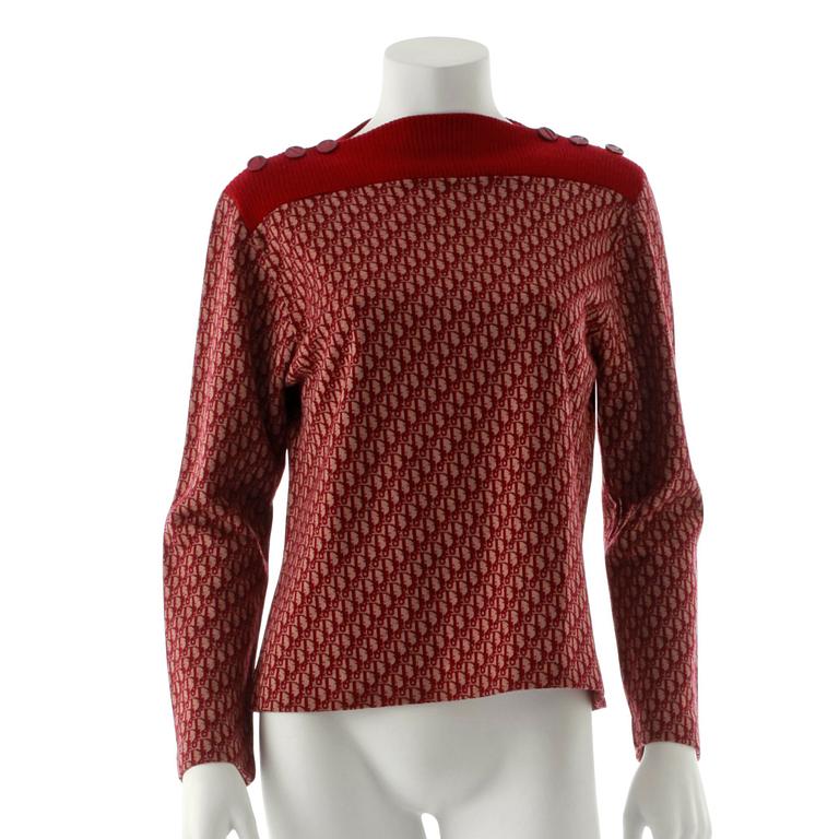 CHRISTIAN DIOR, a wine red monogrammed sweater i wool and blend material.