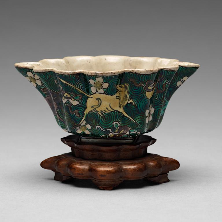 A famille verte bisquit cup, Qing dynasty, 17th century.