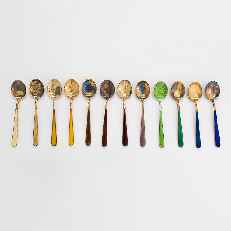 Tillander, a 12-piece set of enamelled and gilt sterling silver coffee spoons, Helsinki 1971-76.