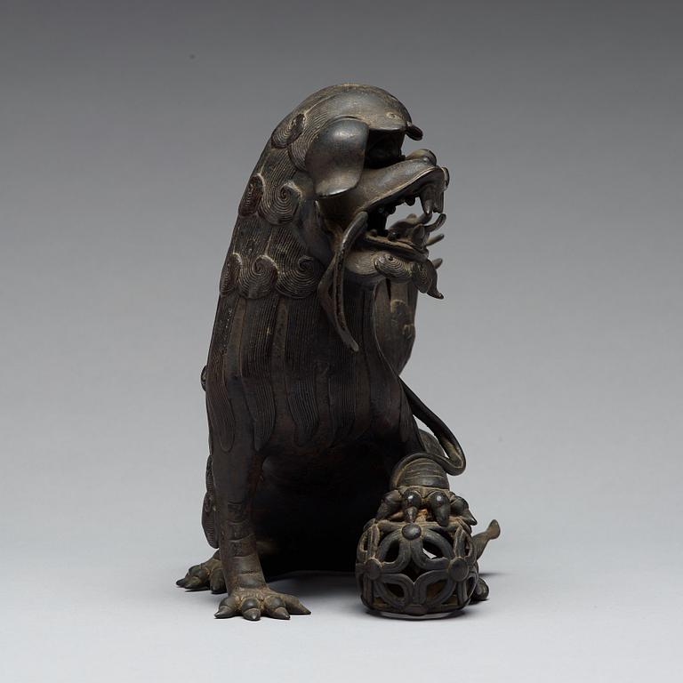 A bronze censer with cover in the shape of a Buddhist lion, Qing dynasty, 19th Century.