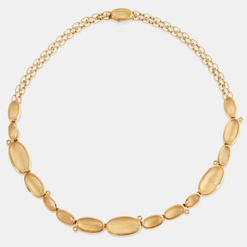 979. An H Stern "Justine" 18K gold necklace set with cabochon-cut rock crystal.