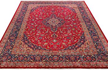 A Keshan carpet, c. 408 x 295 cm.