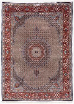 A Moud carpet, part silk, signed, c. 345 x 249 cm.