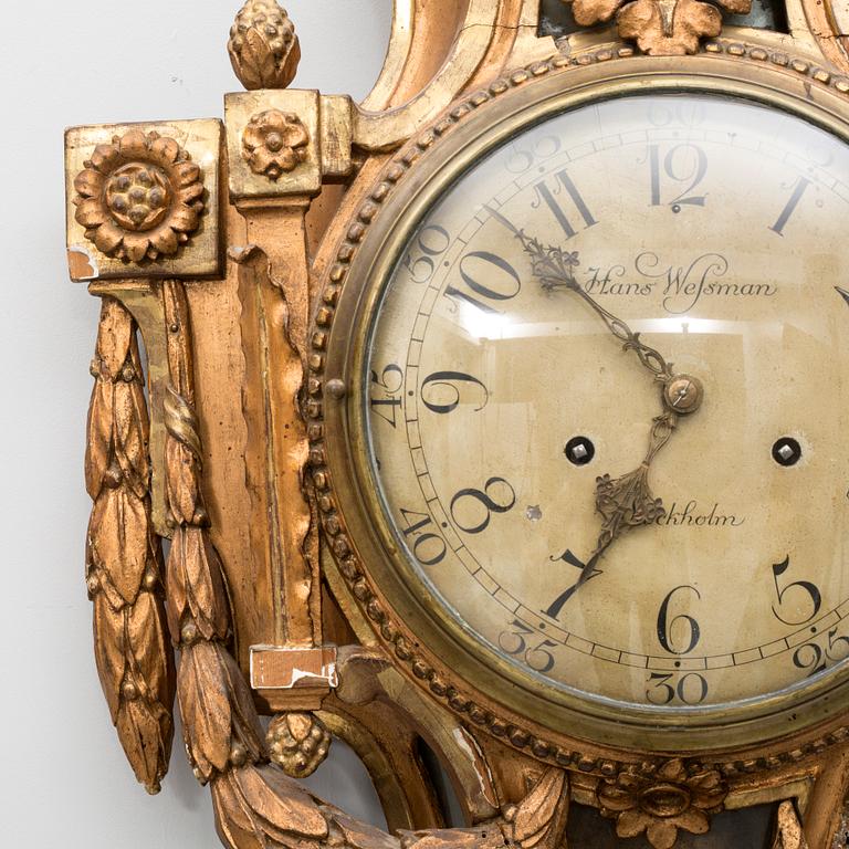 A gustavian wall clock, dial marked "Hans Wessman, Stockholm", around year 1800.