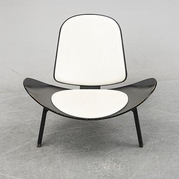 Hans J Wegner, a 'The Smiling Chair/CH07' easy chair from Carl Hansen & Søn, Odense, Denmark.