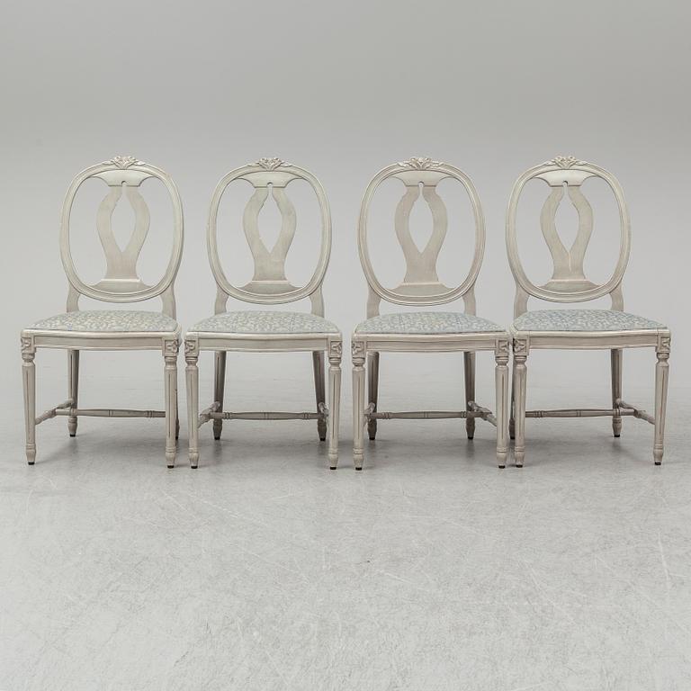 A dining table and four chairs, gustavian style, late 20th century.