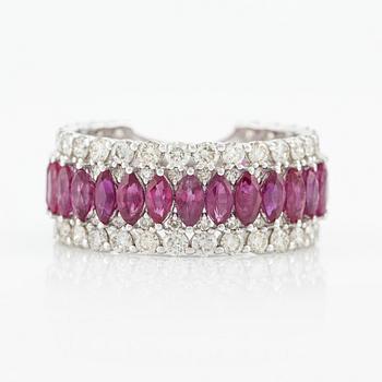 Ring with navette-shaped rubies and brilliant-cut diamonds.