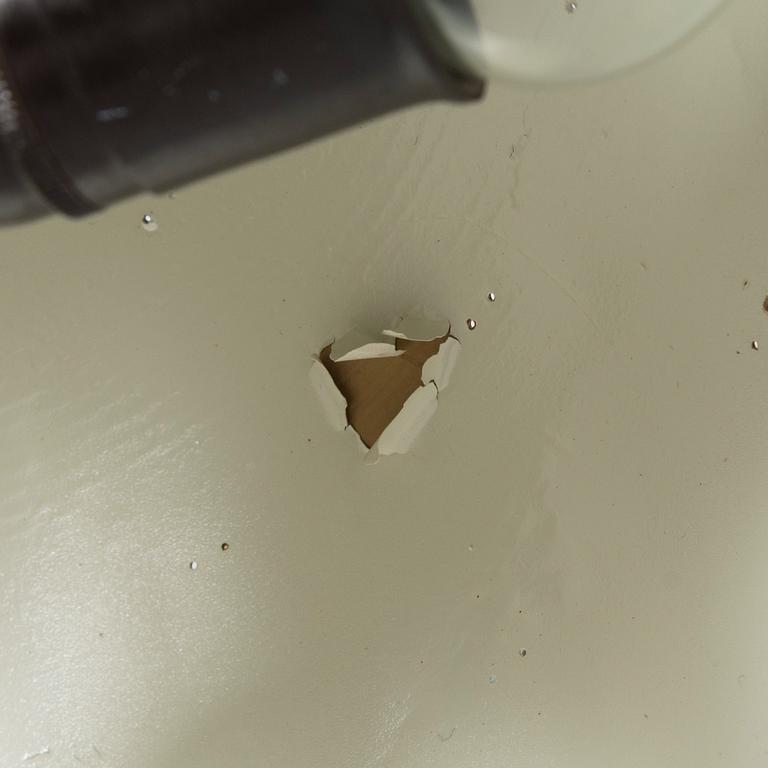 Kattovalaisin, 1900-luvun puoliväli.