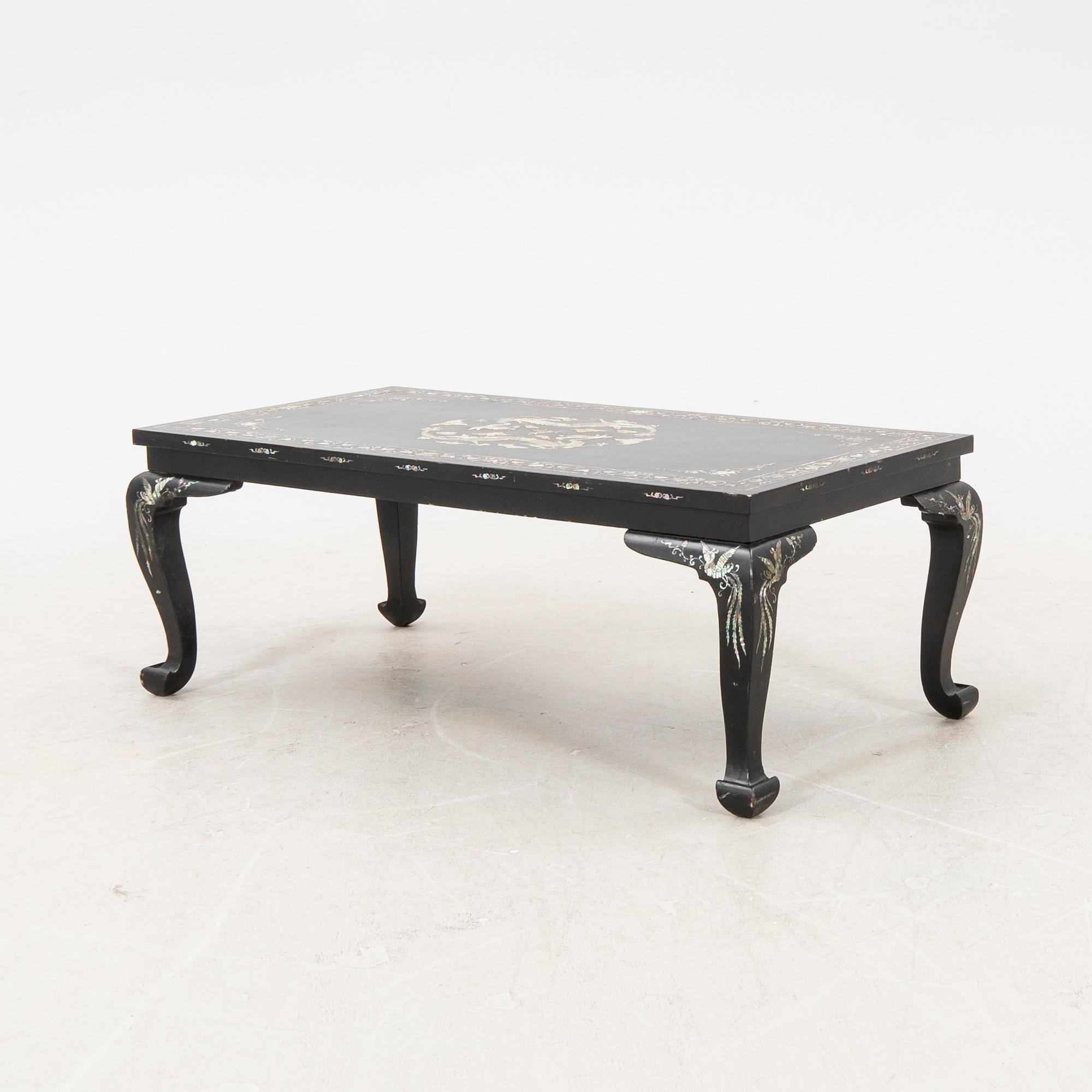 A Chinese lacquered coffee table later part of the 20th century.