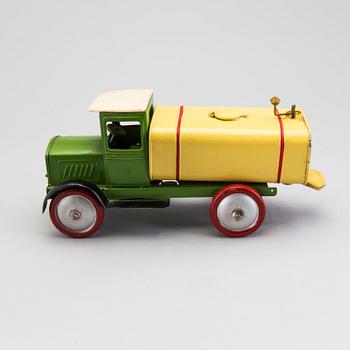 A water spraying truck, Germany, ca 1950.