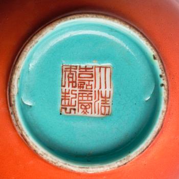 A coral red-enameled double-gourd vase, Qing dynasty with Jiaqing mark (1796-1820).
