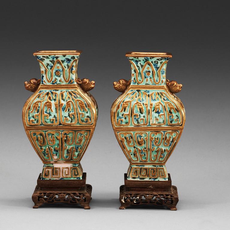 A pair of vases, late Qing dynasty (1644-1912), with Qianlong sealmark.