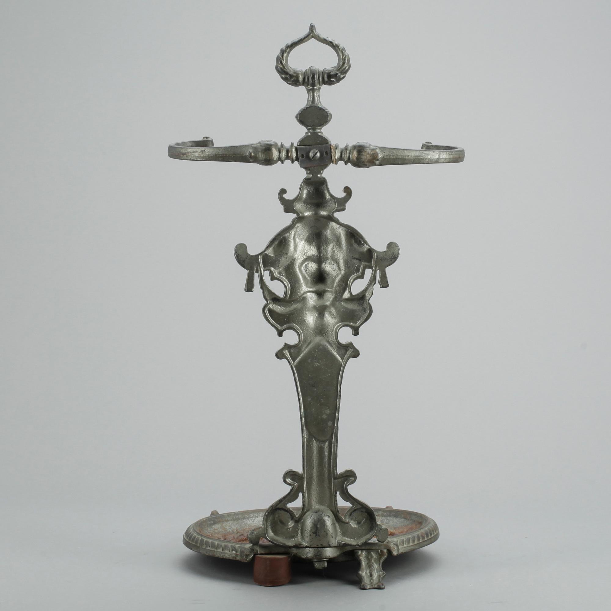 PARAPLYSTÄLL, gjutjärn, omkring sekelskiftet år 1900.