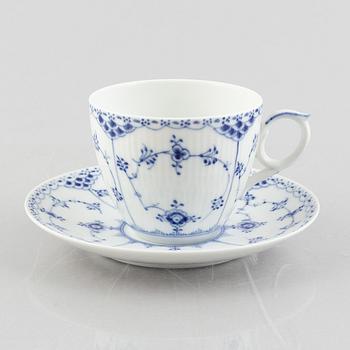 A large 'Blue Fluted Half Lace' porcelain tea cup with saucer, Royal Copenhagen, model 703, post 1923.