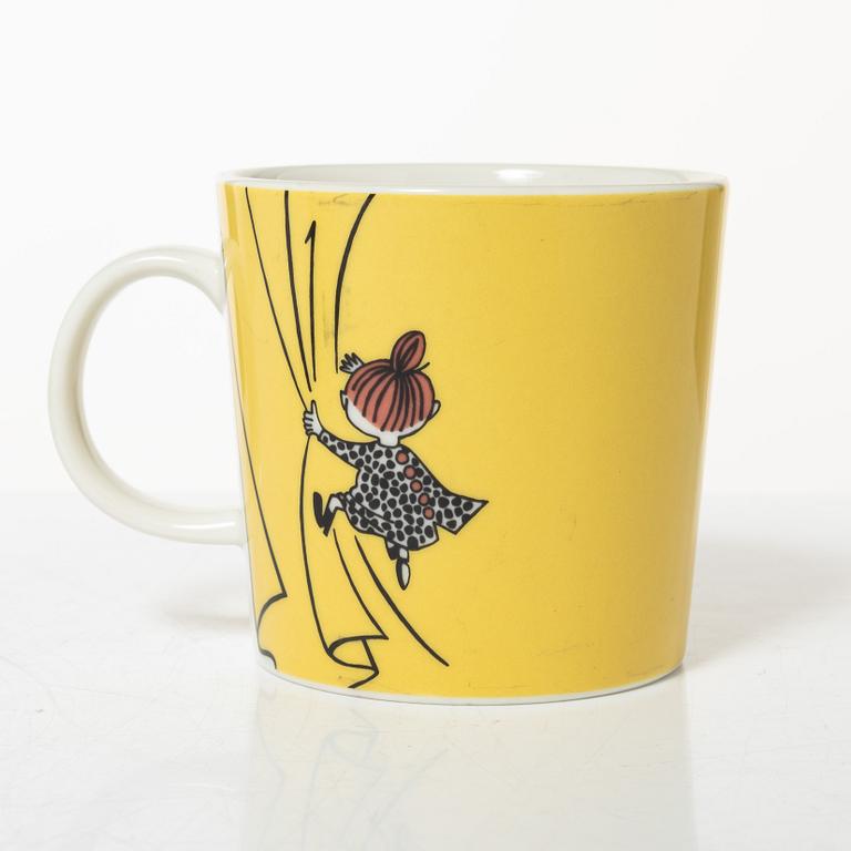 A set of 31 Moomin mugs, Arabia, Finland.