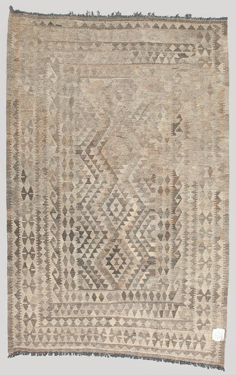 A Kilim carpet, ca. 262 x 176 cm.