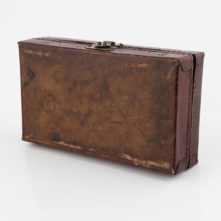 A Chinese leather box, late Qing dynasty.