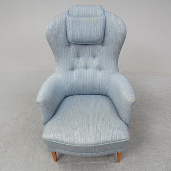 A second half of the 20th Century armchair by Carl Malmsten.