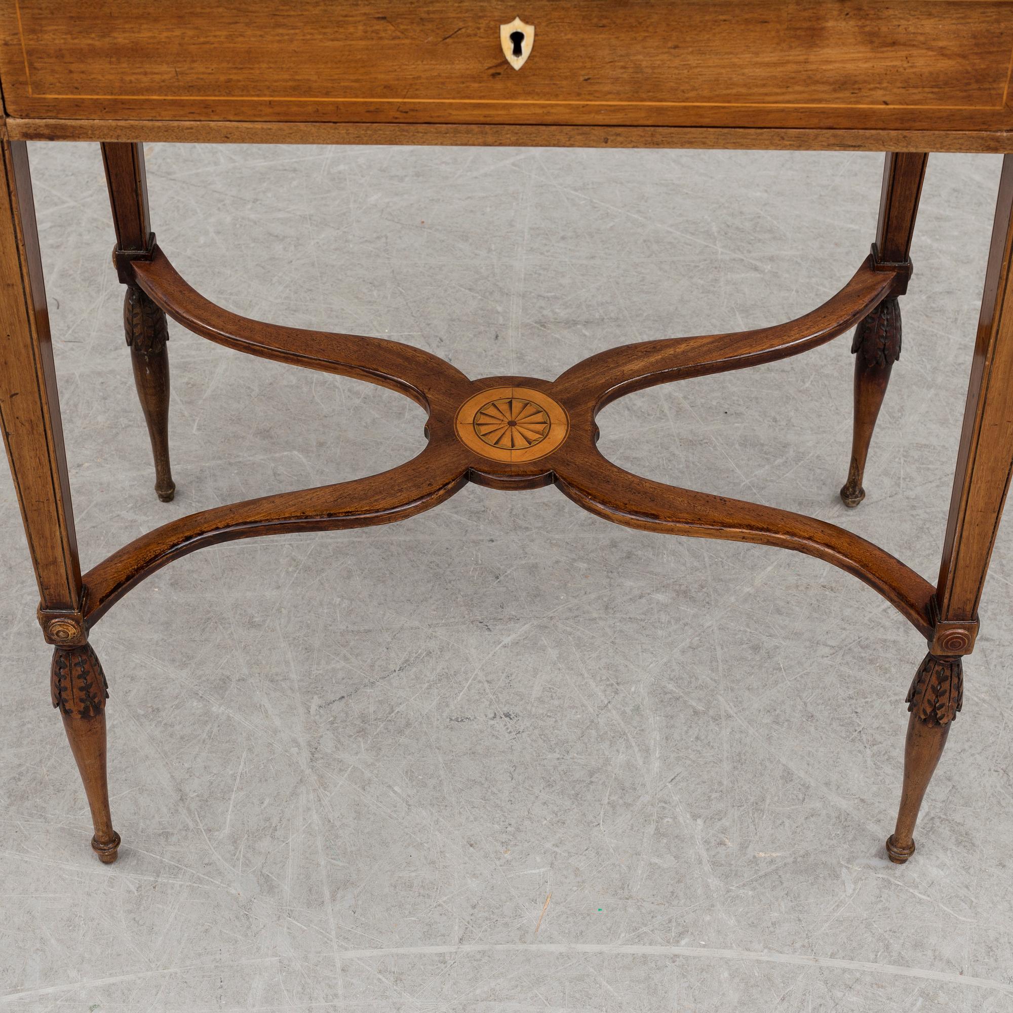 A circa 1800 table in the style of Lars Qvarnberg.