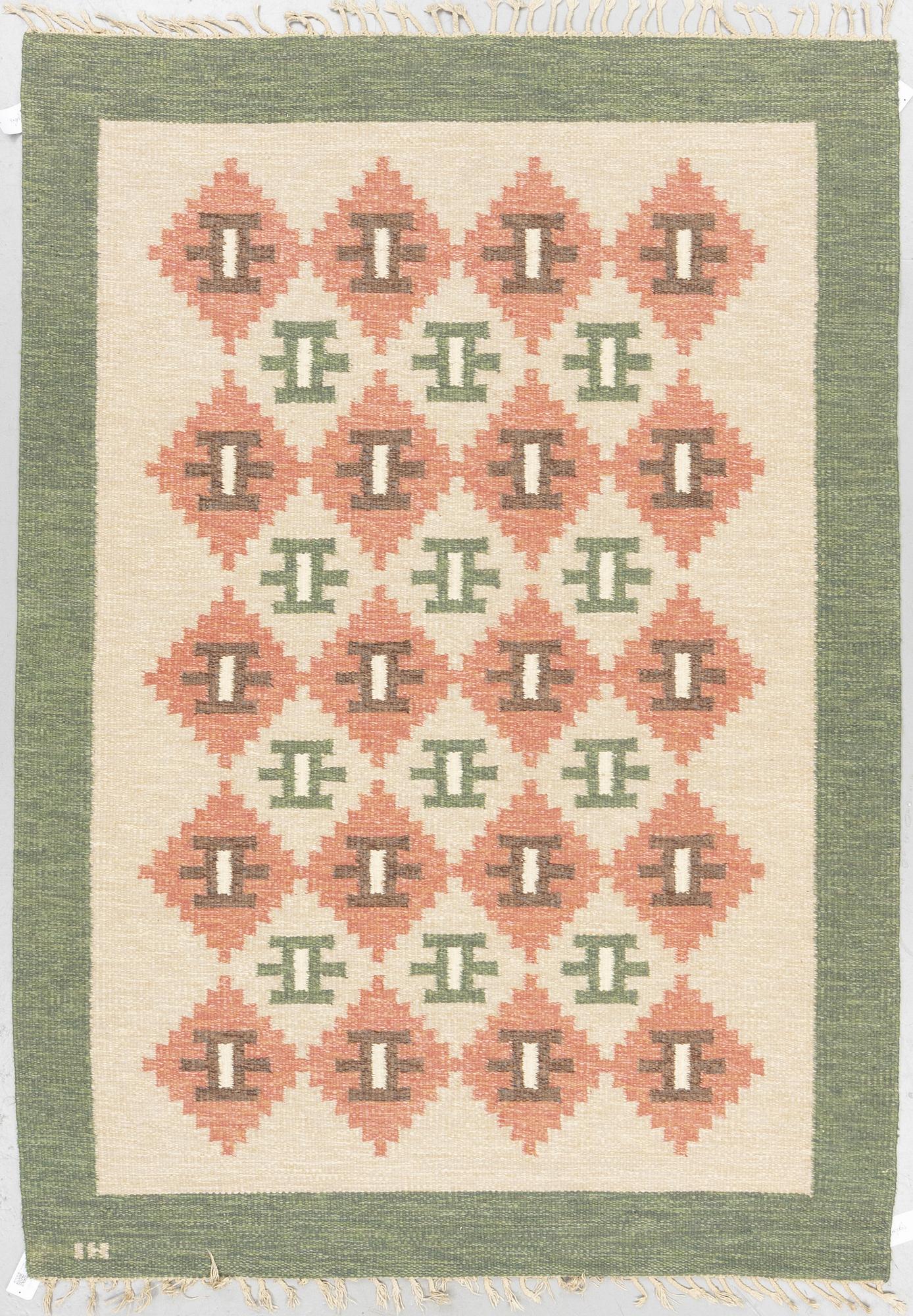 A carpet, flat weave, ca 227,5 x 163,5-168,5 cm, signed IH.