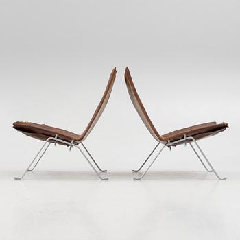 Poul Kjaerholm, a pair of brown leather "PK-22" chairs, edition E Kold Christensen.