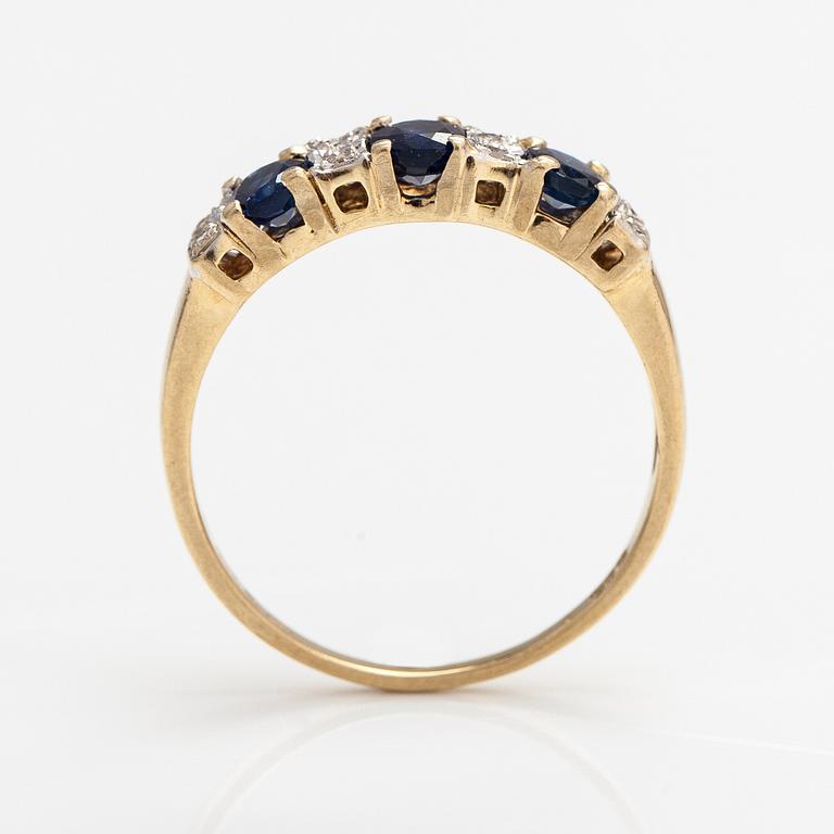 A 14K gold ring with diamonds ca. 0.05 ct and sapphires. Finnish import marks 1990.