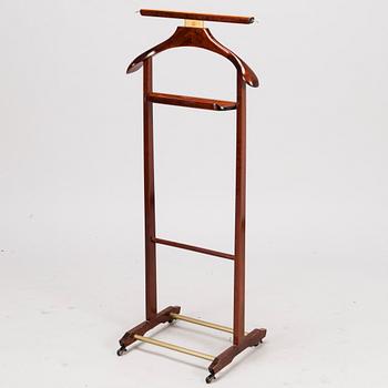 An Italian Fratelli Reguitti valet stand from the latter half of 20th century.