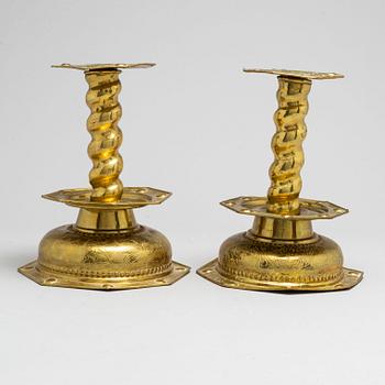 Two Swedish Baroque brass candlesticks, second half of the 17th century.