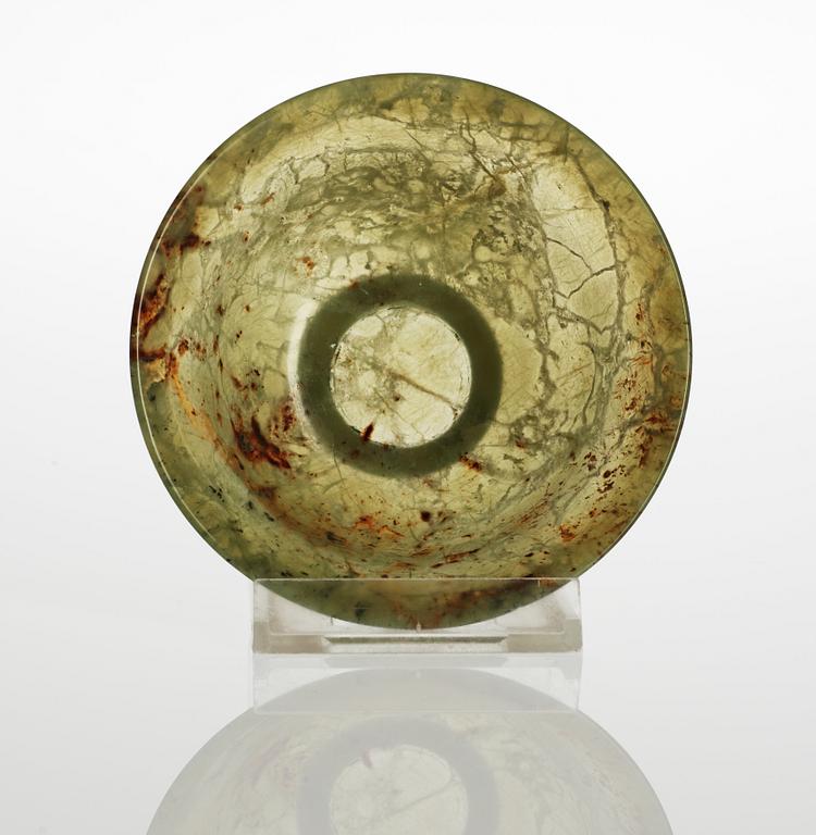 A green bowl, probably nefrit.