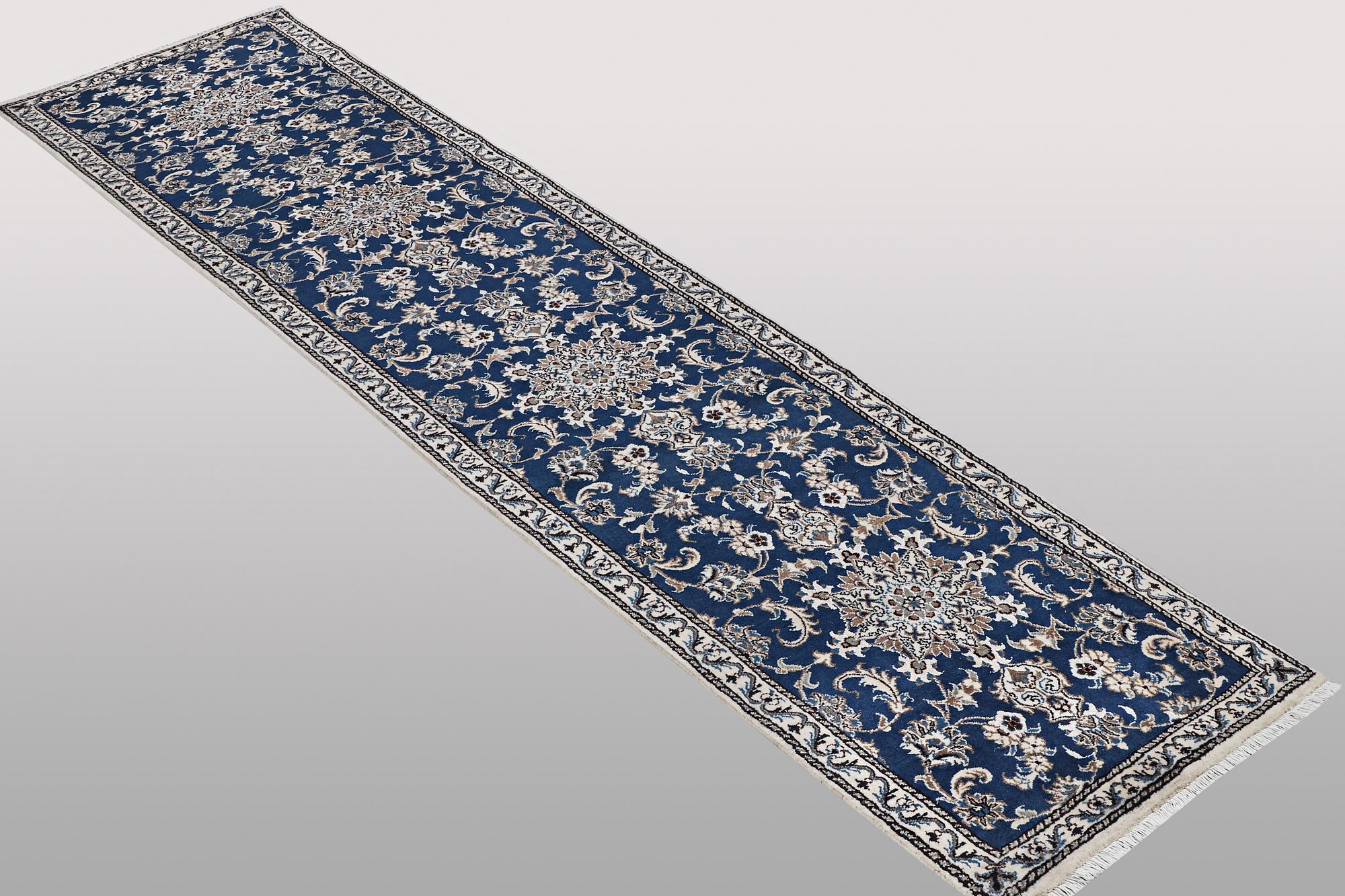 A runner carpet, Nain, part silk, ca 374 x 75 cm.