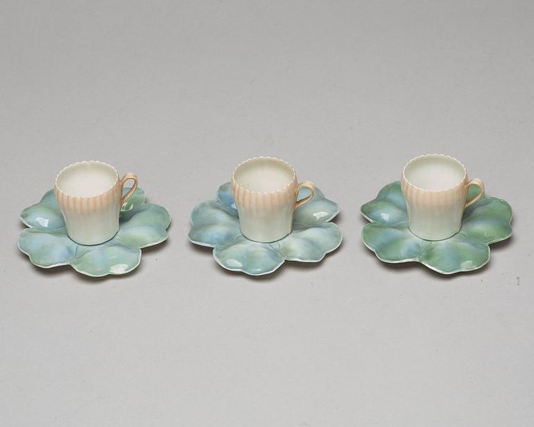 A set of six (3+3) cups with stands, Denmark, Bing & Gröndahl, early 20th Century.