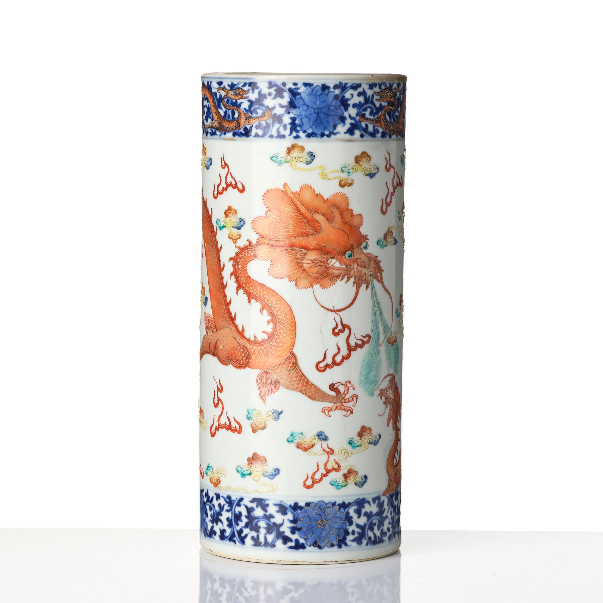 A Chinese 'dragon' porcelain brush stand, Qing dynasty, Guangxu mark and period (1875-1908).