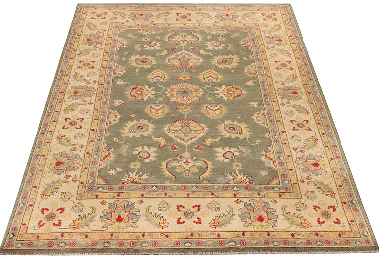 A Kazak carpet, c. 304 x 195 cm.