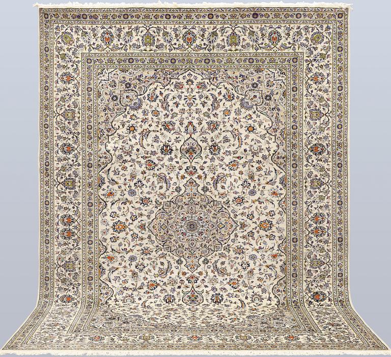 A Keshan carpet, 355 x 260 cm.