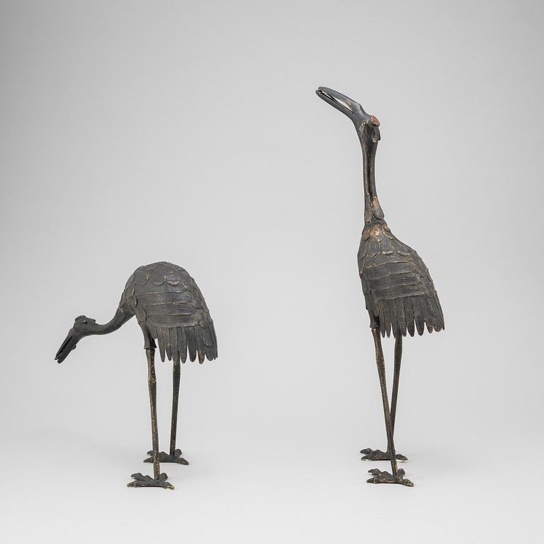 A pair of Chinese metal cranes, first half of the 20th century.