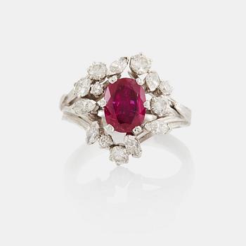 A WA Bolin ring set with a faceted pink sapphire and round brilliant- and navette-cut diamonds.