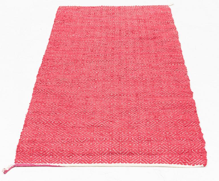 A carpet, cirkc 193 x 79 cm.