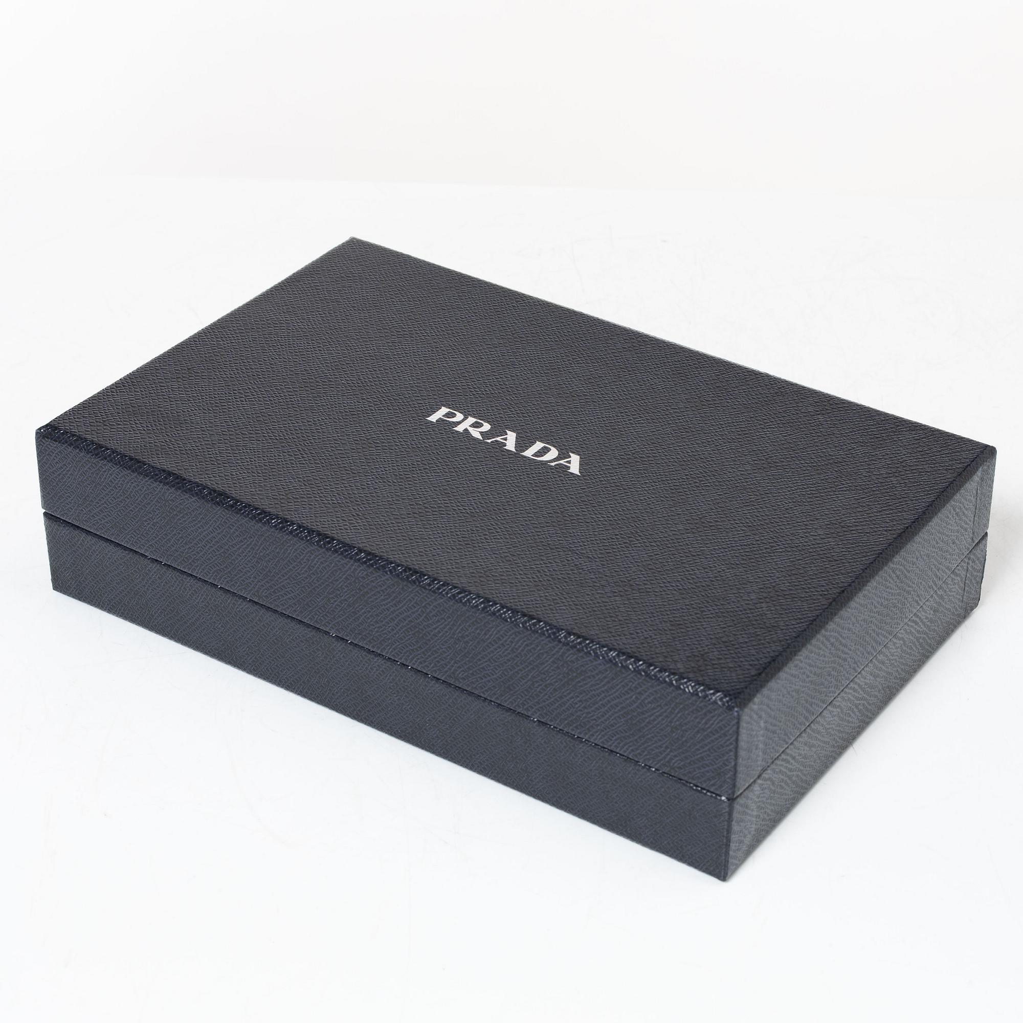 Prada, wallet on chain, 2016.