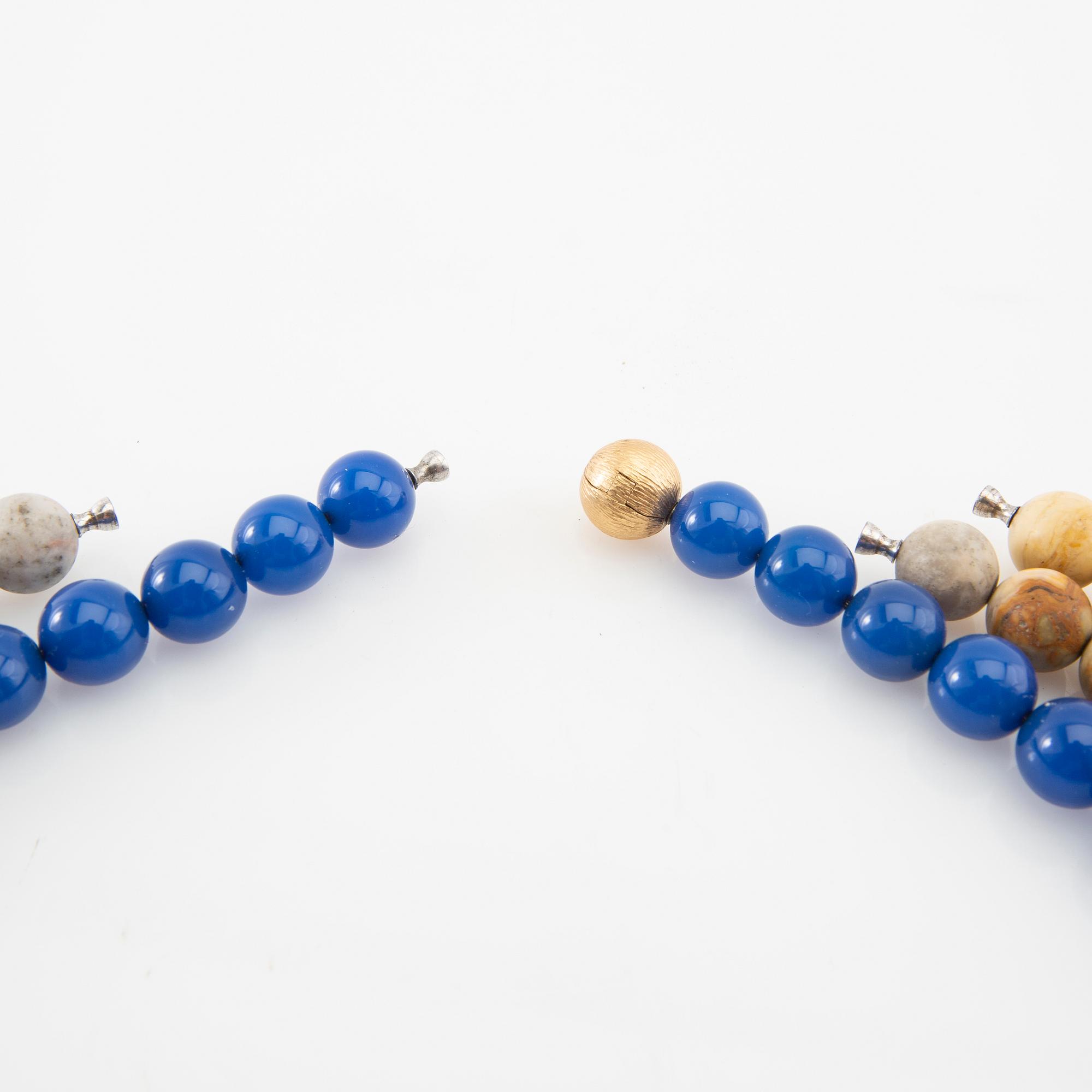 Ole Lynggaard, clasp in 18K gold with 4 pieces of stone necklace.