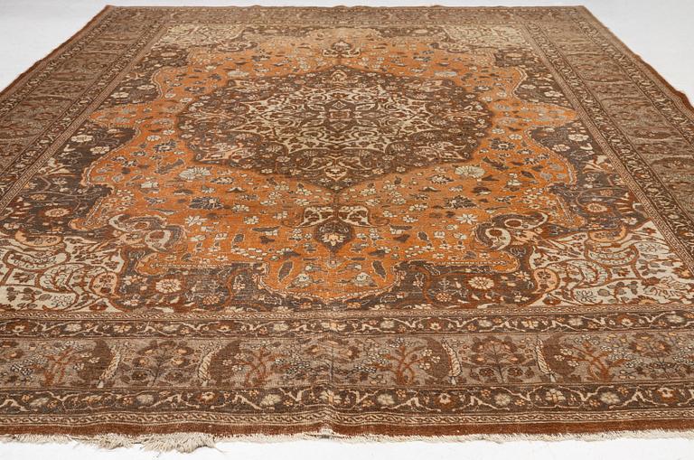 An antique Tabriz carpet, Northwest Persia, 453 x 310 cm.