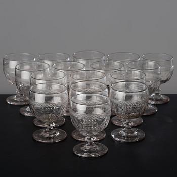 A set of 16 cut glass wine goblets, circa 1900.