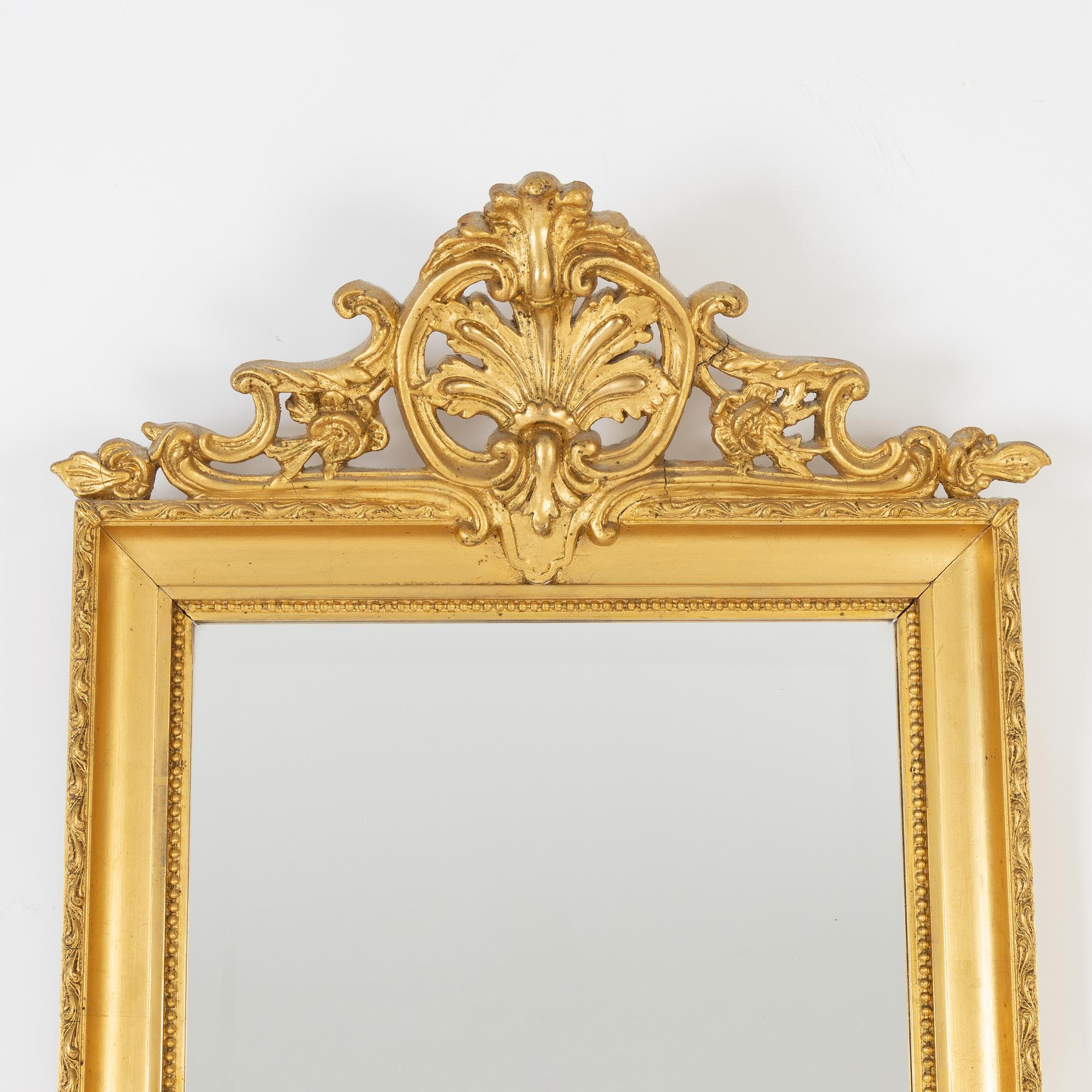 Spegel med konsolbord, rokokostil, omkring år 1900.