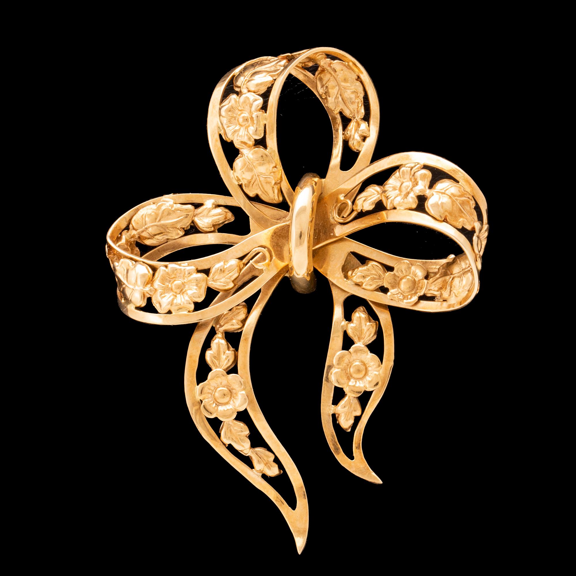 Brosch 18K guld Stockholm 1947.