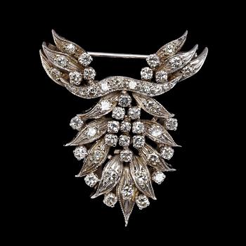 1031. BROOCH, brilliant cut diamonds, tot. app. 1 cts.