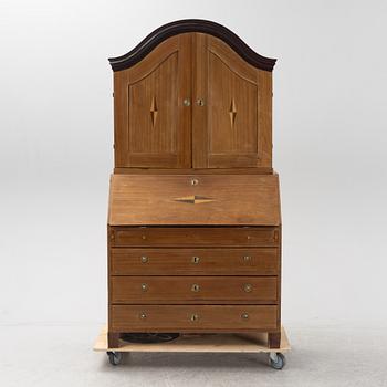 A mahogany-veneered Empire cabinet, first part of the 19th Century.