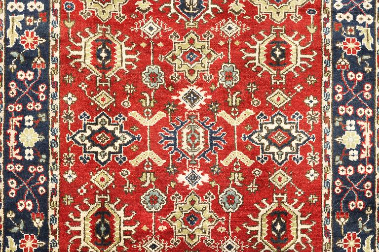 A carpet, Mamluk design, c. 308 x 242 cm.