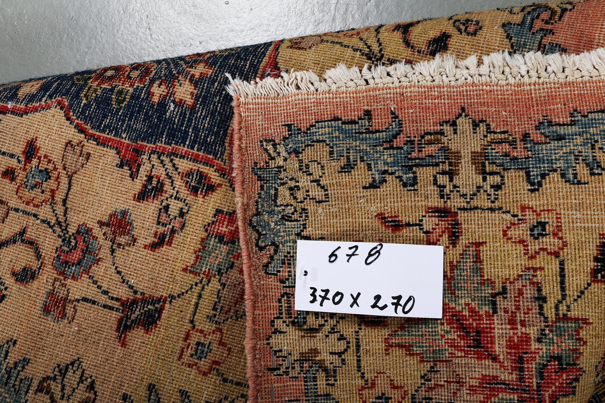 A carpet, old Kerman, ca 370 x 270 cm.