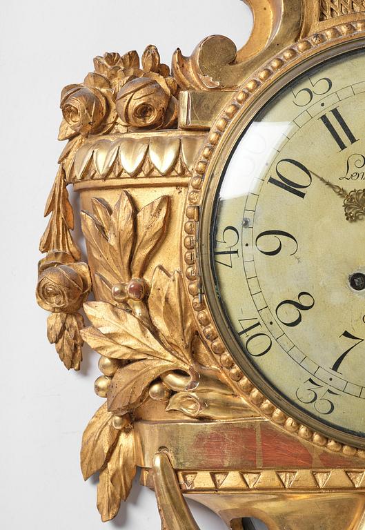 A Gustavian giltwood cartel clock by L. Adamson Wester (watchmaker in Stockholm 1780-95).