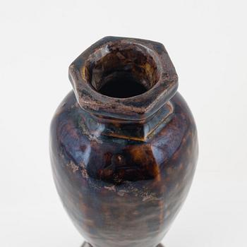 A brown glazed vas, Ming dynasty (1368-1644).