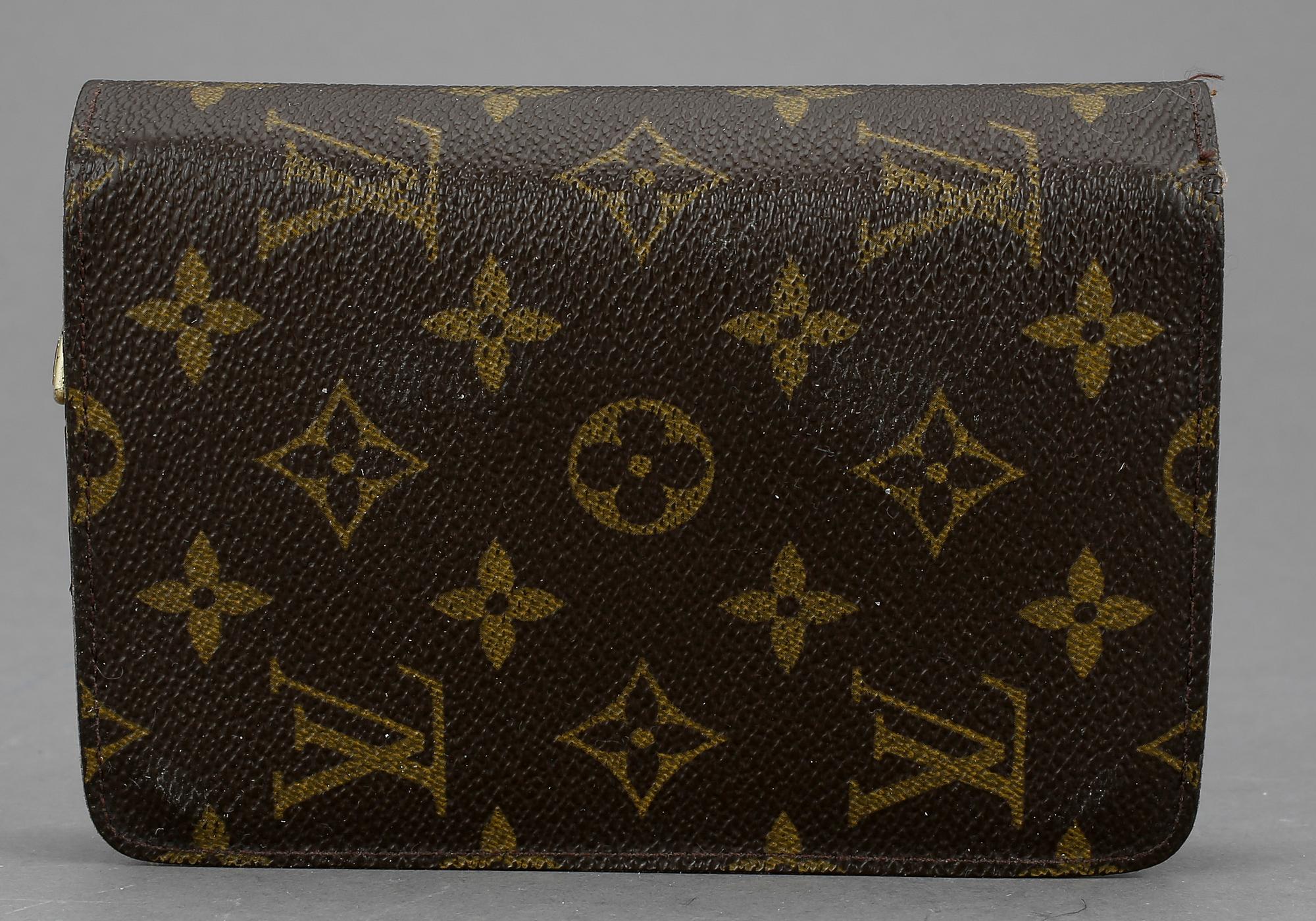 PLÅNBOK, "Compact zippy", Louis Vuitton.